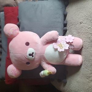 Sanrio teddy bear with flowers and ice cream cone color is pink light pink